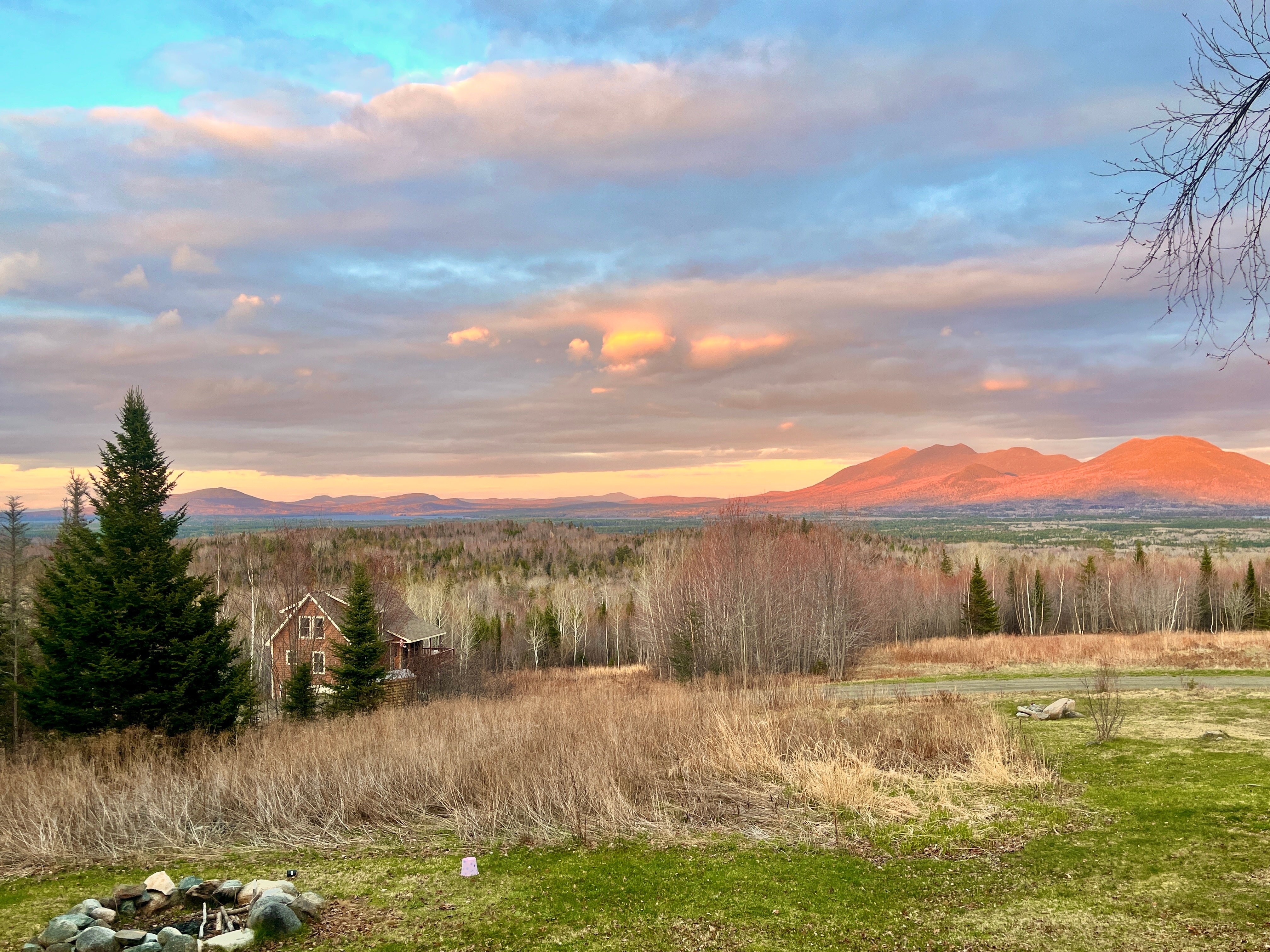 A beautiful rainbow like sky looking over Flagstaff Lake and the Bigelow Mountain Range in the North West Corner of Maine. Just 40 minutes north of The Study in Kingfield Maine